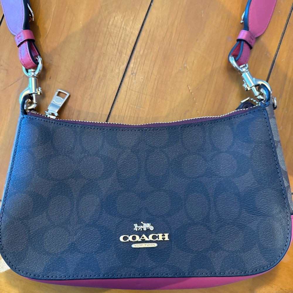 Coach Jess baguette signature c coated canvas with pink bottom and strap